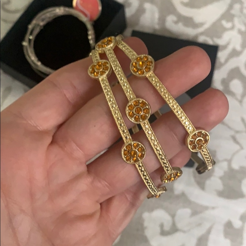 Three gold bracelets, never worn